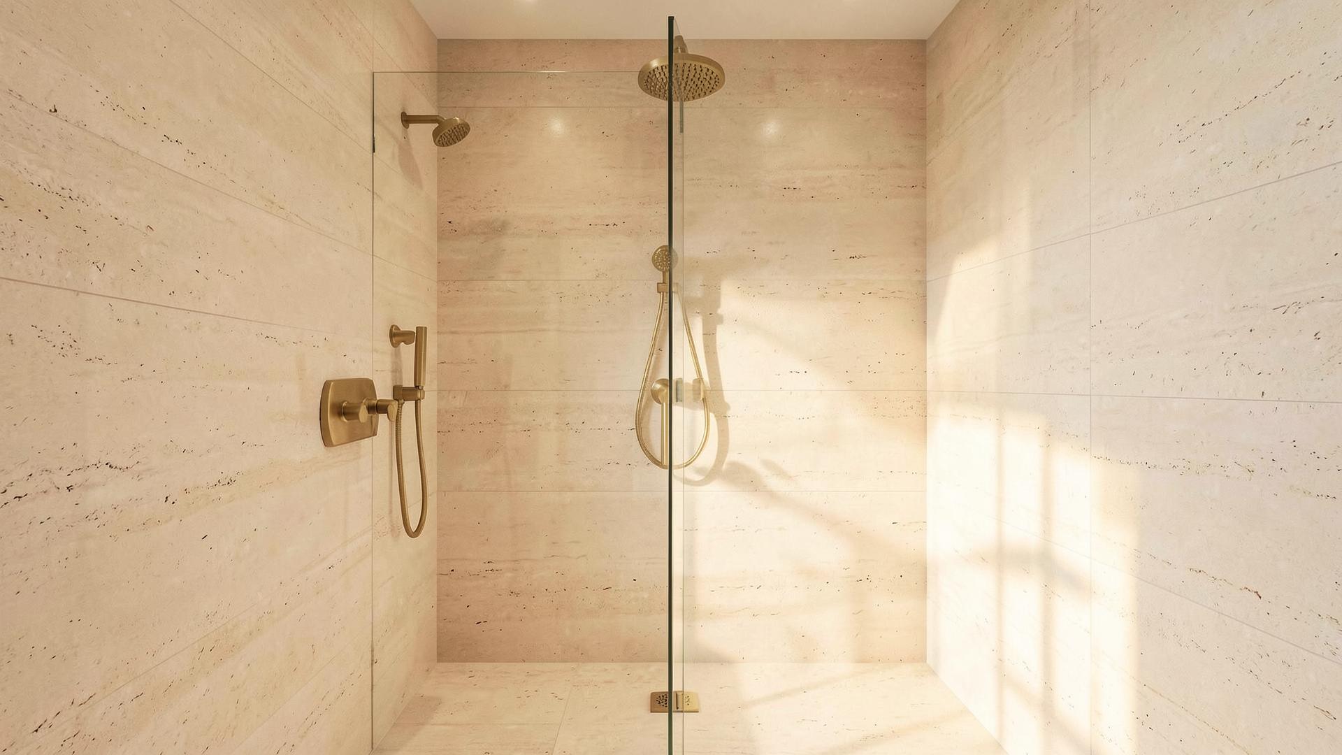 Luxury spa-like bathroom with travertine stone walk-in rainfall shower